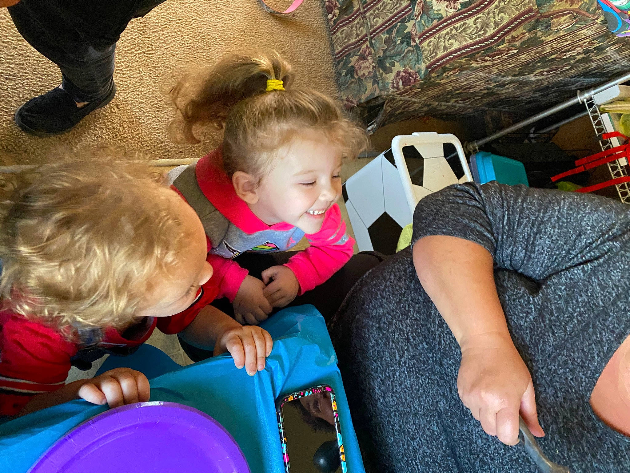 Astrid is registered to the contest to win money with this photo: child, fun, joy, lap, leg, leisure, person, play, sharing, sitting, toddler