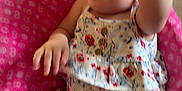 Mariellis joined the competition — help win amazing prizes! baby, carpet, casual, child, cute, floral_outfit, hand, heart_shaped, home, indoor, infant, legs, patterned_clothing, pink_blanket, playing, relaxed, smile, sunglasses, toddler, young_child