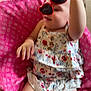 Mariellis joined the competition — help win amazing prizes! toddler, child, baby, sunglasses, heart_shaped, pink_blanket, floral_outfit, indoor, carpet, hand, legs, smile, playing, cute, young_child, casual, relaxed, home, patterned_clothing, infant