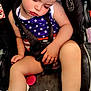 Mariellis is registered to the contest to win money with this photo: toddler, sleeping, car_seat, child, headband, star_pattern, clothing, seatbelt, sneakers, footwear, baby, cute, nap, safety, rest, portrait, face, hand, indoor, person