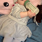 Mariellis joined the competition — help win amazing prizes! baby, sleeping, headband, bottle, tutu, dress, pillow, pink, blue, blanket, cute, soft, cozy, child, tights, hand, face, resting, indoors, plush