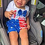 baby, child, car_seat, smile, blue_eyes, hat, clothing, stars, stripes, red, white, blue, shorts, shirt, bow, person, seatbelt, happy, independence_day, infant