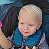 Sawyer is registered to the contest to win money with this photo: baby, child, toddler, car_seat, safety_harness, portrait, face, blond_hair, blue_eyes, smiling, sitting, vehicle, travel, indoors, close_up, clothing, hand, infant, happy, photography
