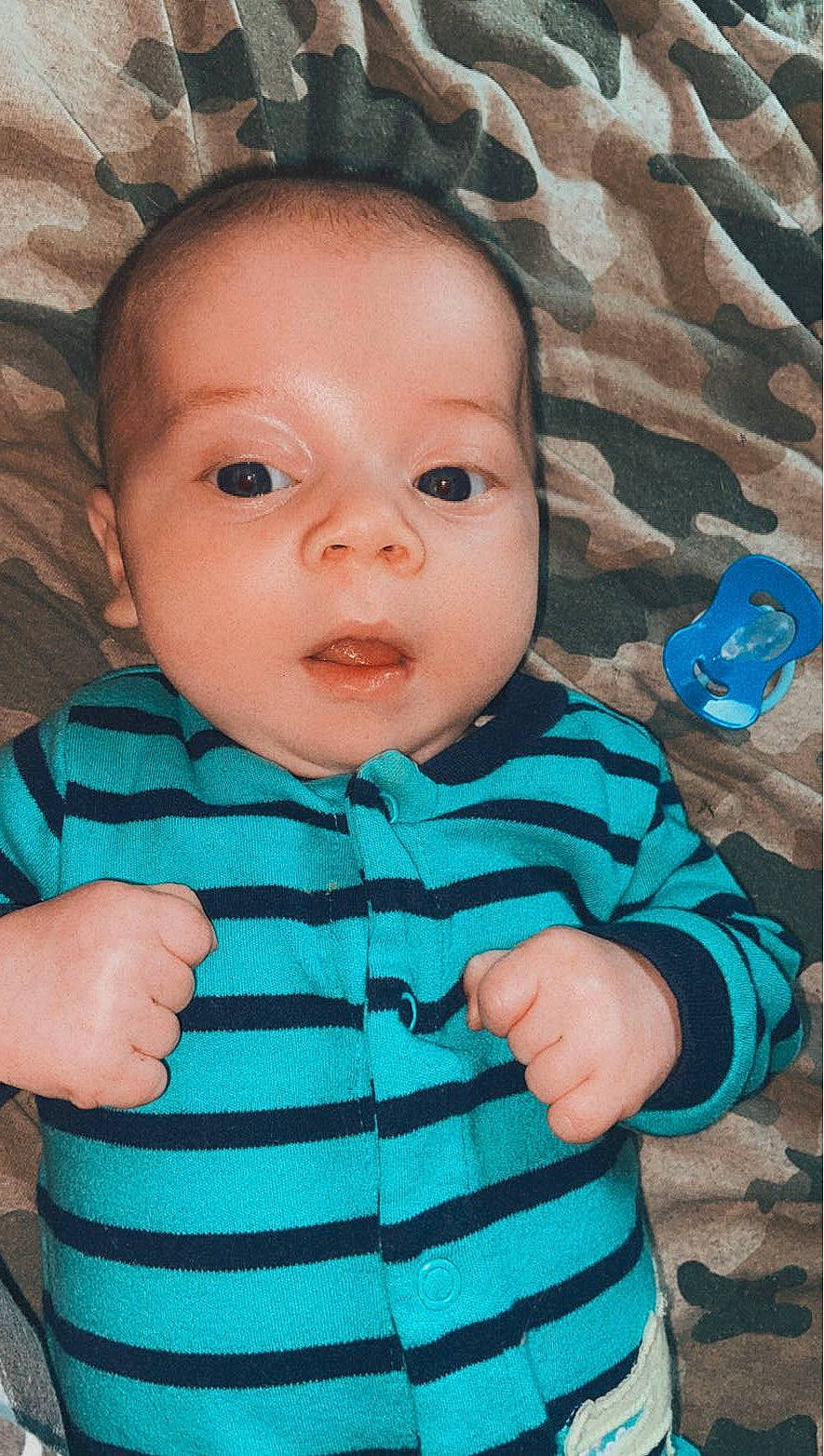 Paxton joined the competition — help win amazing prizes! azure, baby, baby_toddler_clothing, cheek, chin, eye, finger, gesture, head, human_body, iris, lip, mouth, nose, organ, person, pink, skin, sleeve, textile