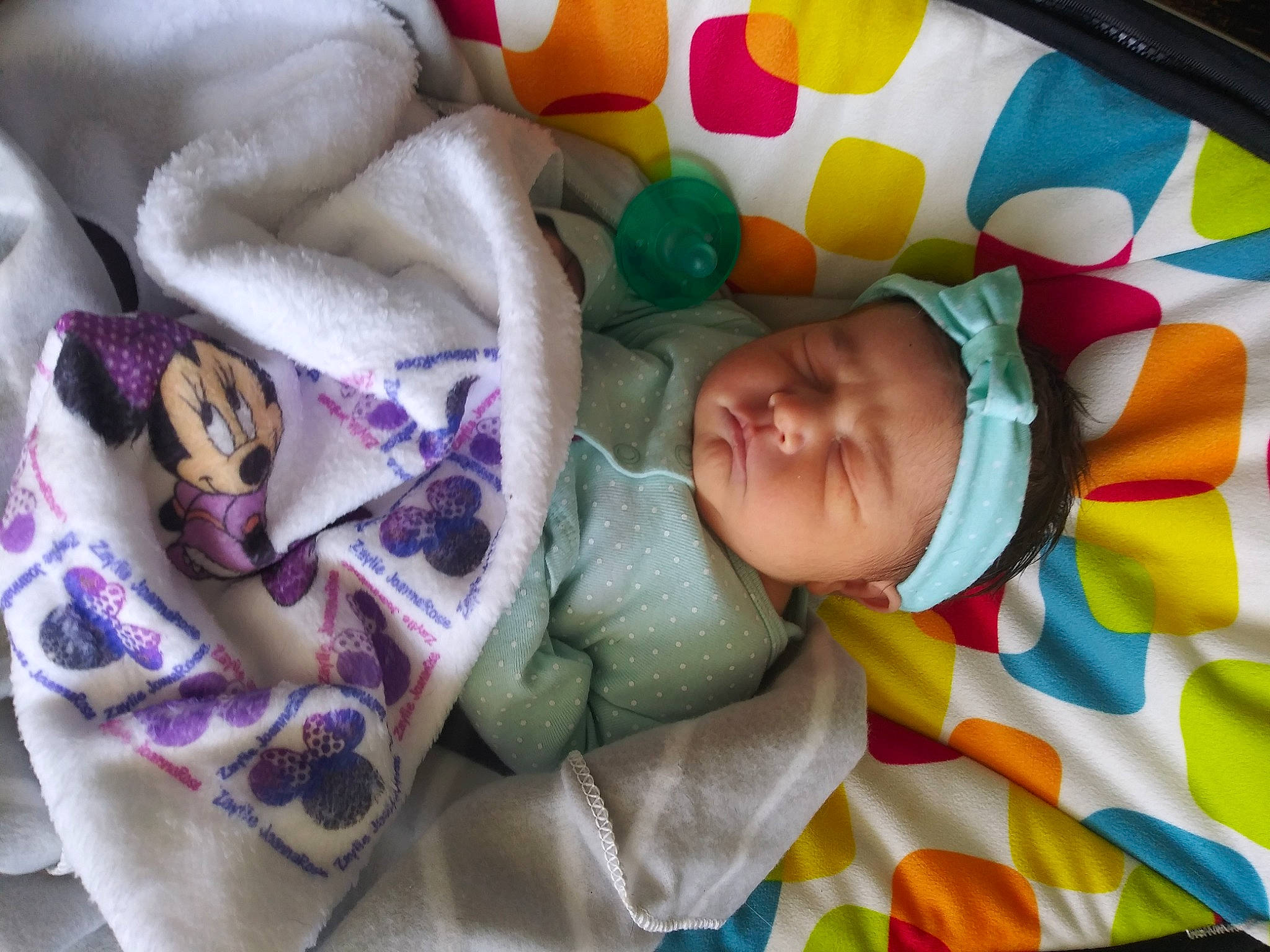 Zaylie is registered to the contest to win money with this photo: baby, baby_products, baby_toddler_clothing, bedding, bedtime, cheek, child, comfort, eye, head, headwear, linens, pattern, person, product, purple, room, skin, textile, toddler