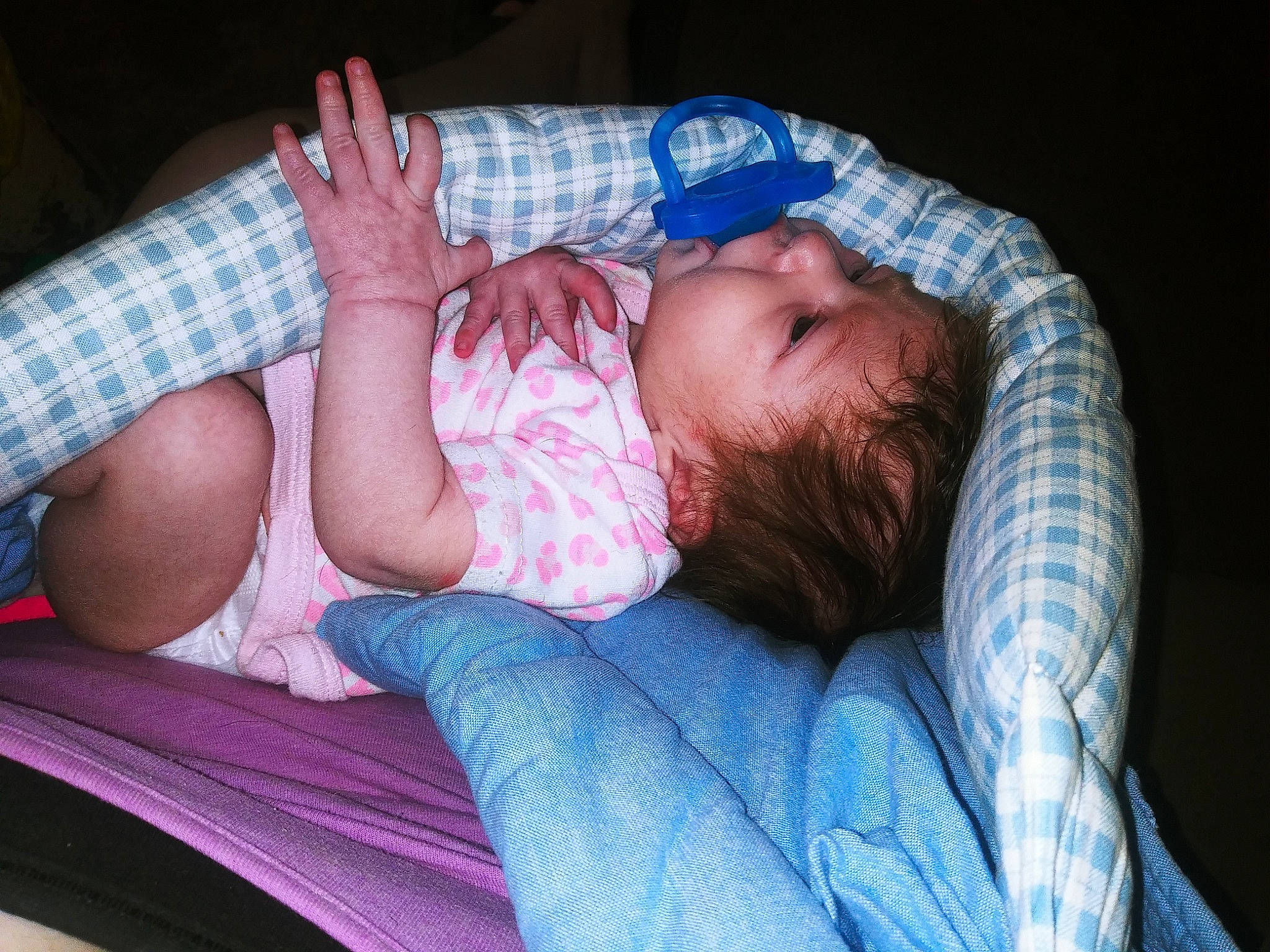 Zaylie is registered to the contest to win money with this photo: arm, baby, baby_toddler_clothing, cheek, child, comfort, eye, finger, flash_photography, hand, human_body, iris, lip, mouth, organ, person, pink, purple, sitting, skin