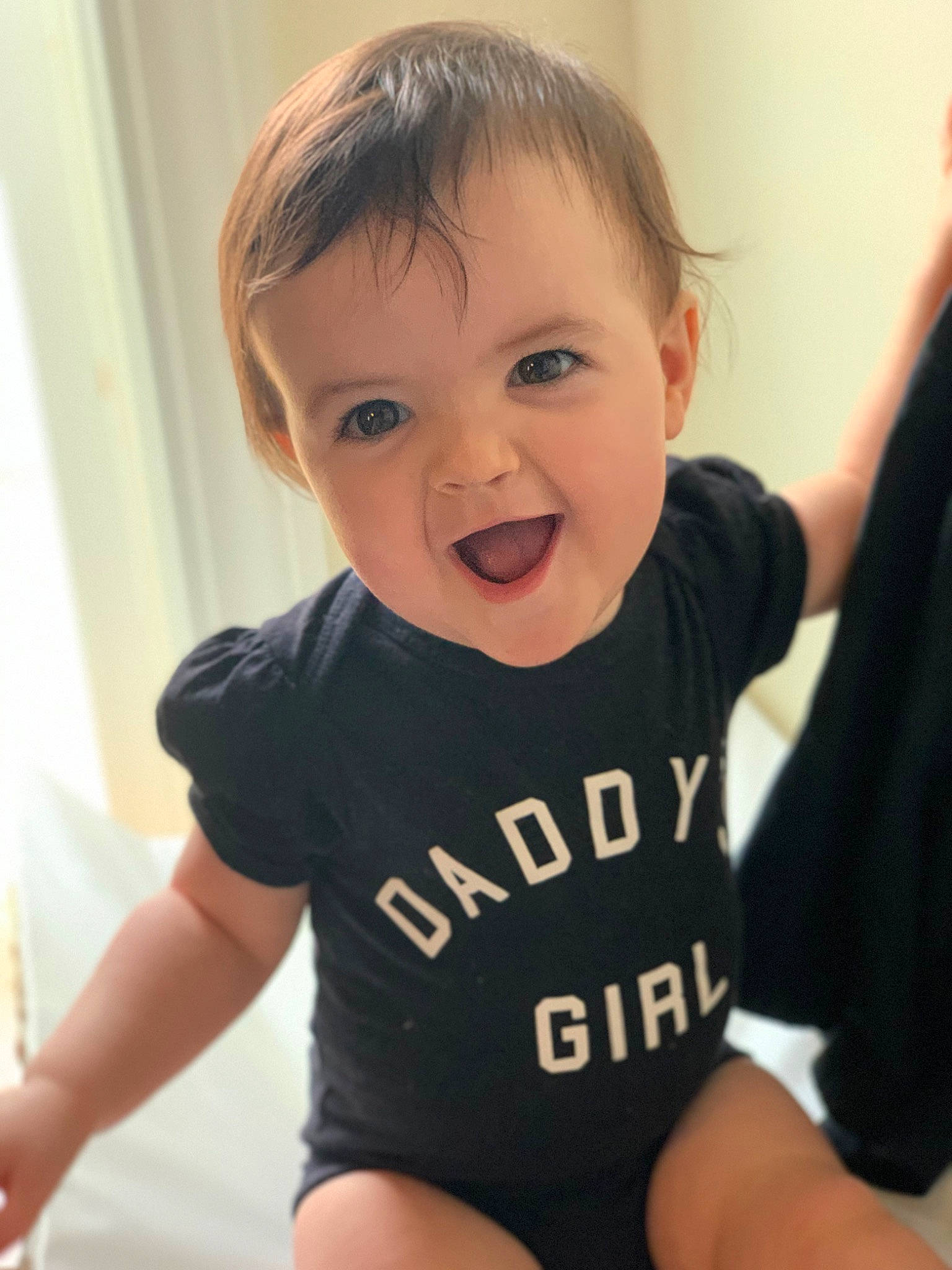 Isabel is registered to the contest to win money with this photo: baby_toddler_clothing, cheek, chin, eyebrow, eyelash, facial_expression, gesture, happy, human_body, iris, joint, lip, mouth, neck, nose, person, shoulder, skin, sleeve, smile