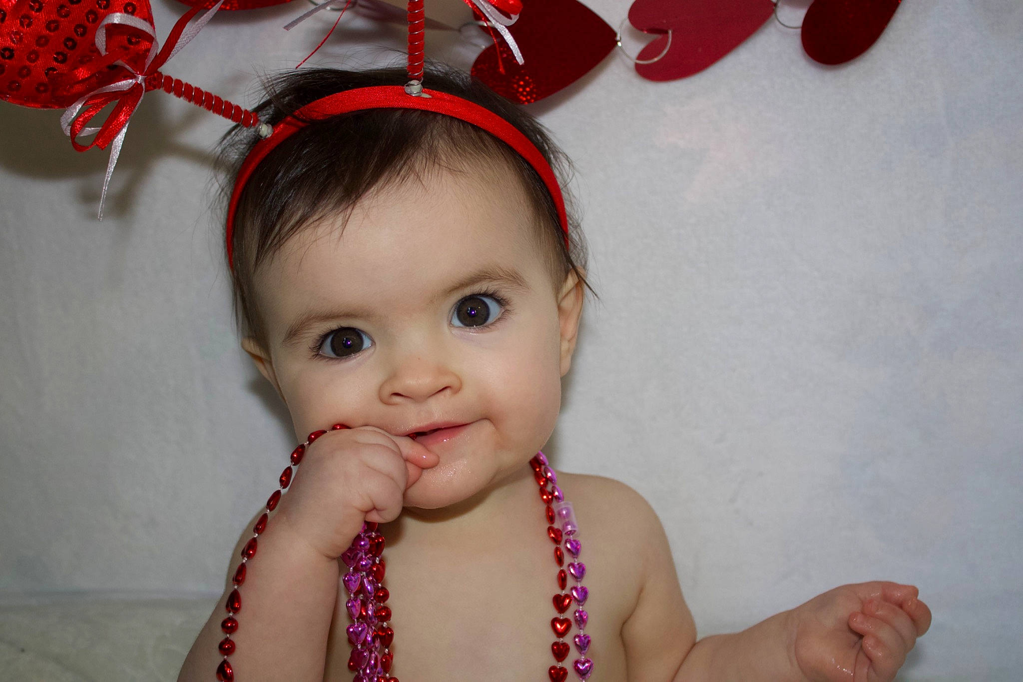 Isabel is registered to the contest to win money with this photo: baby_toddler_clothing, cheek, chin, ear, eye, eyebrow, eyelash, face, facial_expression, happy, head, iris, lip, neck, nose, organ, person, pink, skin, smile