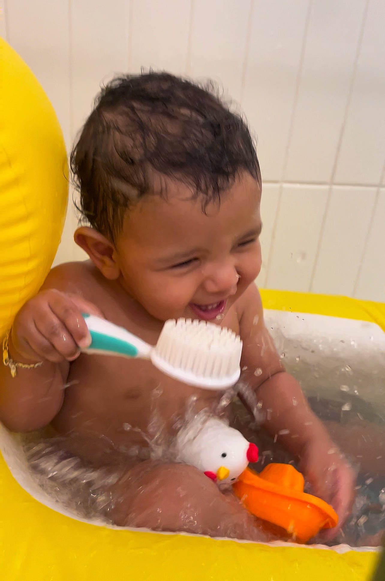 Sinatra joined the competition — help win amazing prizes! baby, balloon, bath_toy, bathing, bathroom, bathtub, chest, child, fun, hand, happy, human_body, leisure, muscle, nose, person, recreation, skin, toddler, water