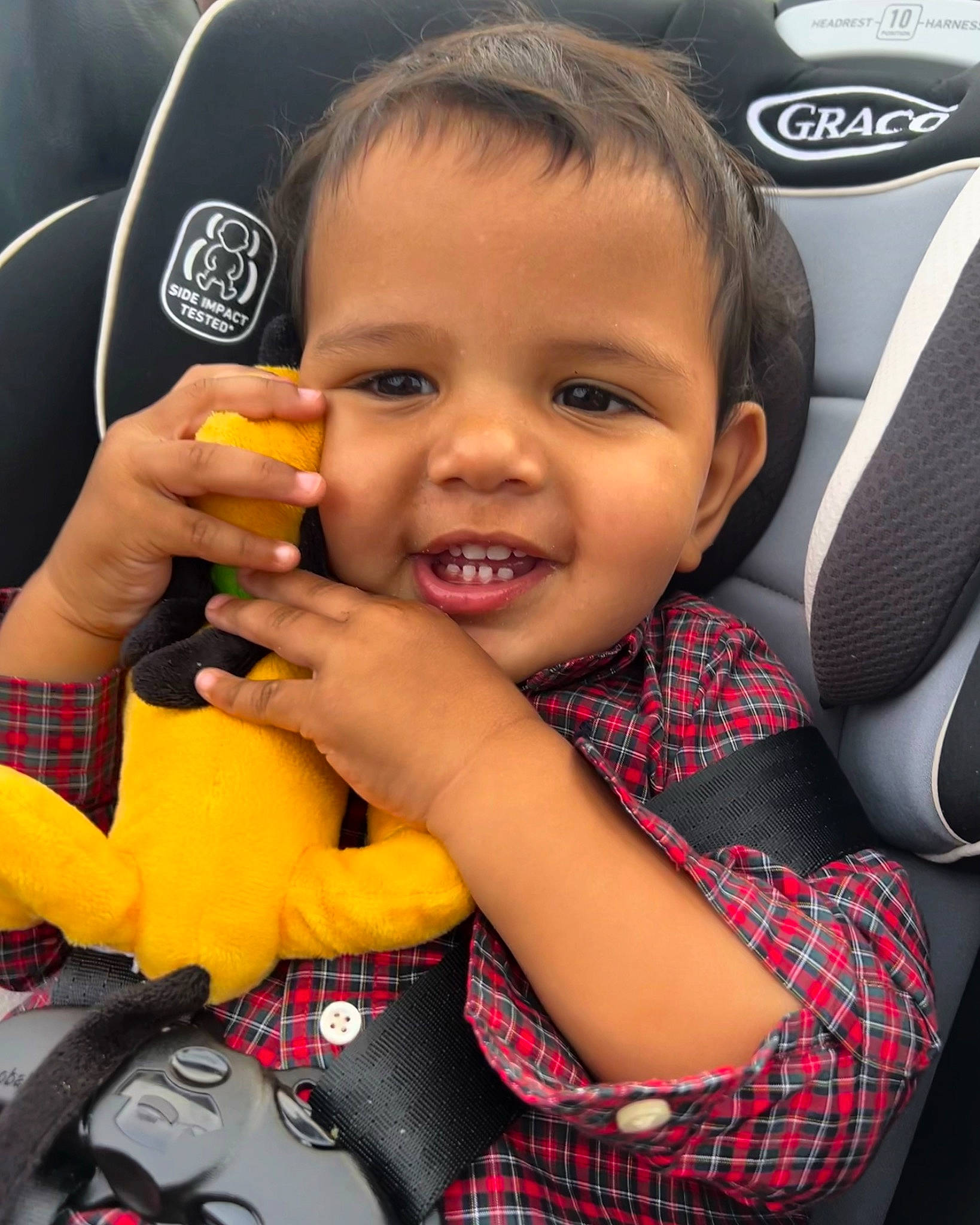 Sinatra joined the competition — help win amazing prizes! auto_part, car_seat, cheek, face, fun, gesture, happy, iris, joy, lip, motor_vehicle, mouth, nail, nose, person, plaid, product, skin, smile, tartan