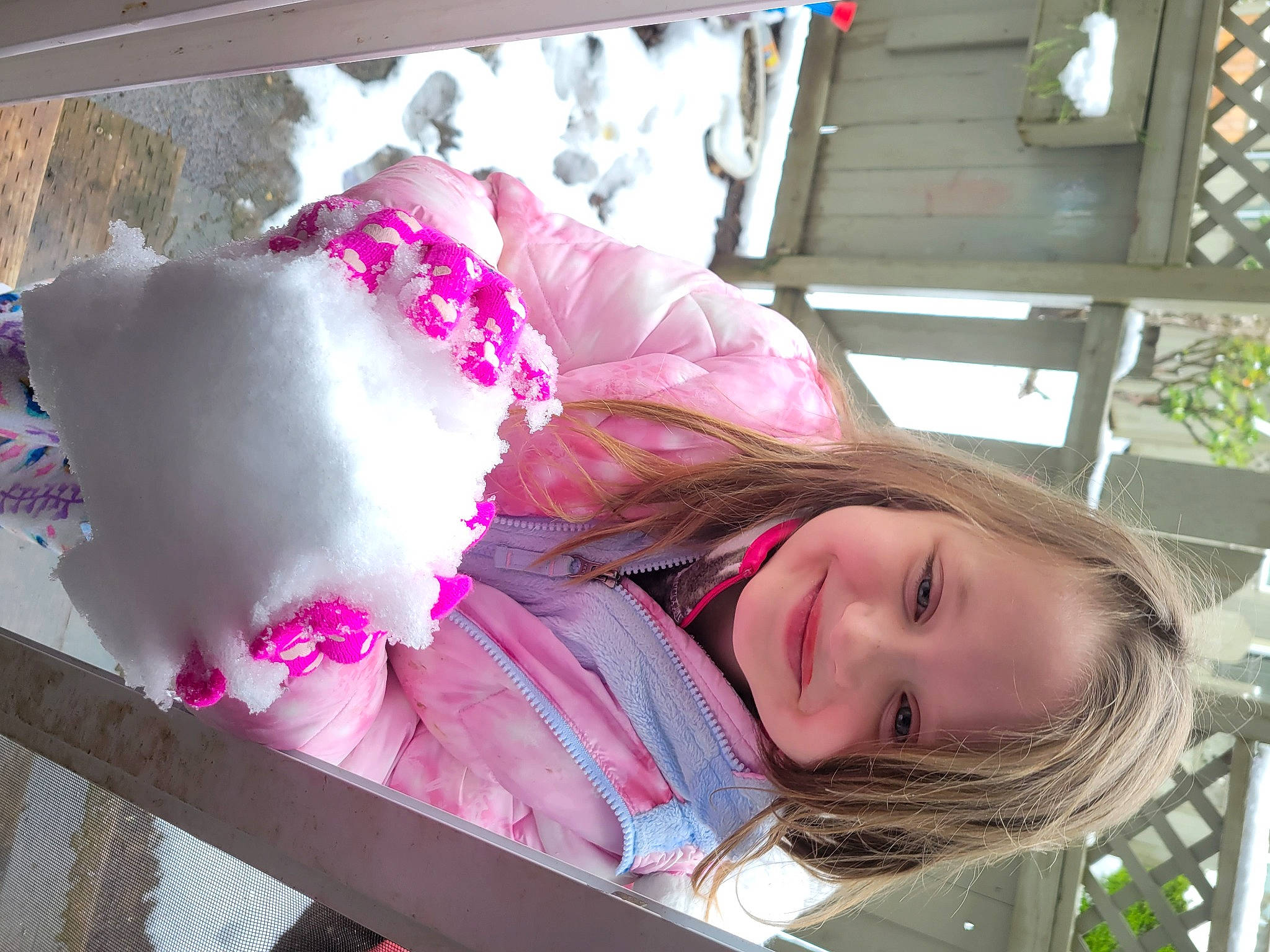 Christine is registered to the contest to win money with this photo: baby, child, face, fun, fur, happy, head, horse, joy, leisure, magenta, person, pink, plant, smile, toddler, tree, winter