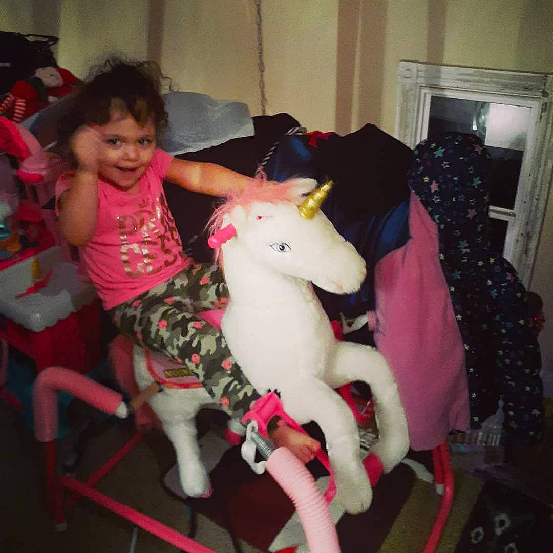 Kiyana joined the competition — help win amazing prizes! amusement_ride, fictional_character, fun, joy, person, recreation, under_exposed, unicorn