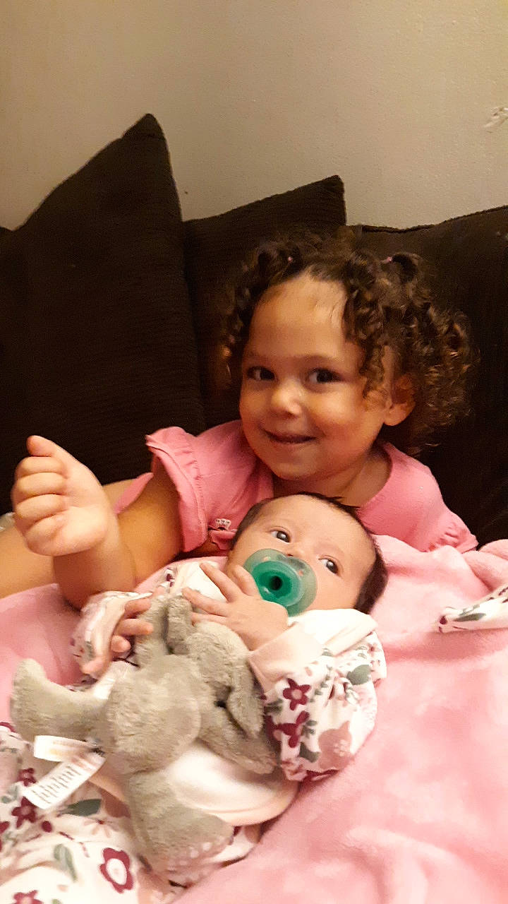 Kiyana is registered to the contest to win money with this photo: baby, birth, child, joy, person, play, sibling, stuffed_toy, teddy_bear, toddler