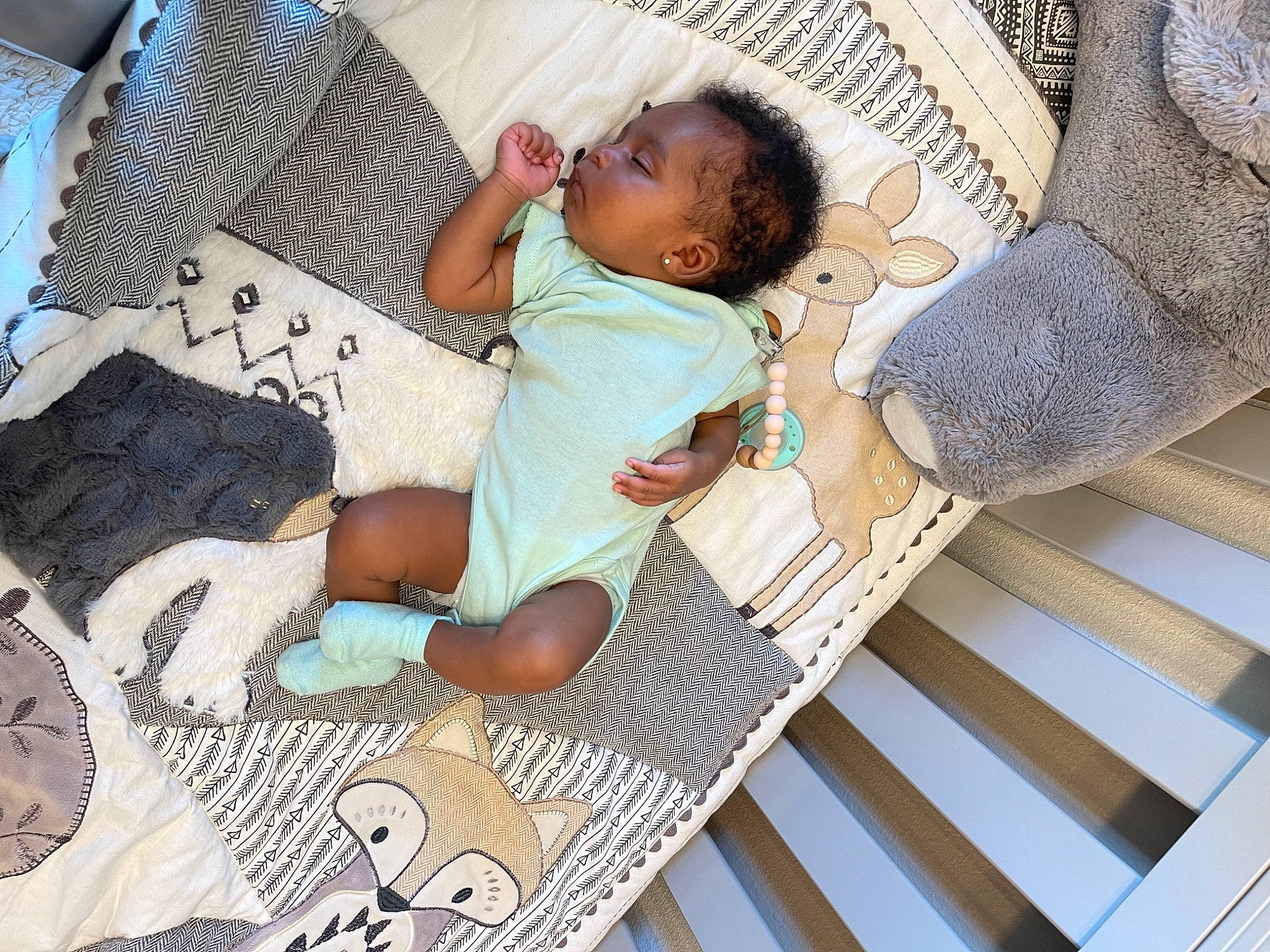 Aubrie joined the competition — help win amazing prizes! baby, bedding, child, comfort, couch, flooring, leisure, linens, nap, outdoor_furniture, pattern, person, pillow, room, sandal, sitting, textile, thigh, throw_pillow, toddler