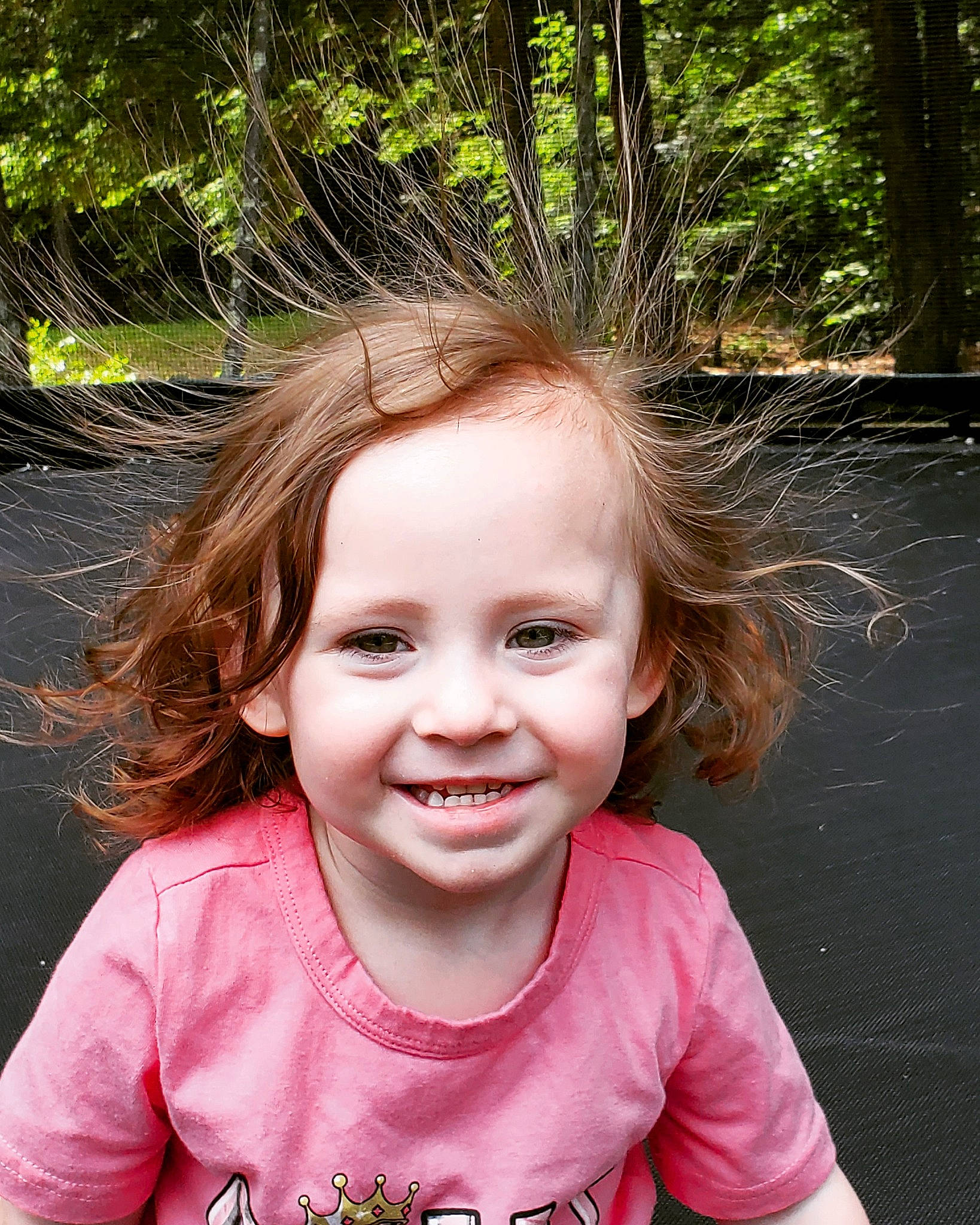Annabelle is registered to the contest to win money with this photo: cheek, child, child_model, face, facial_expression, fun, hair, happy, head, joy, lip, people, person, photography, pink, plant, smile, summer, toddler, tooth