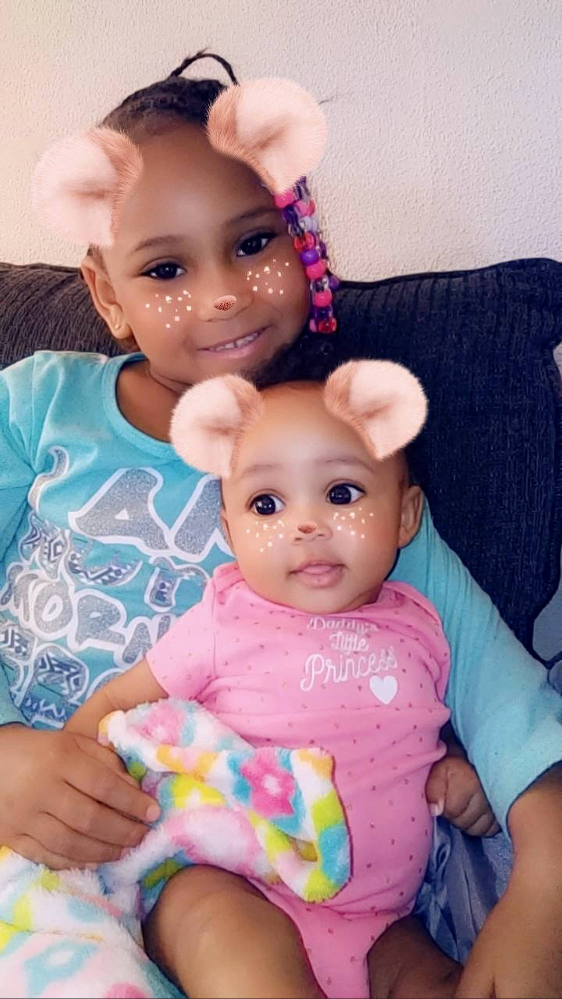 Lailah is registered to the contest to win money with this photo: baby, cheek, child, ear, person, play, sibling, toddler, toy