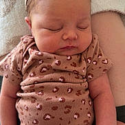 Hazel joined the competition — help win amazing prizes! baby, sleeping, bow, headband, onesie, leopard_print, infant, closeup, soft_blanket, hand, skin, cute, peaceful, newborn, person, child, resting, indoors, casual_clothing, toddler