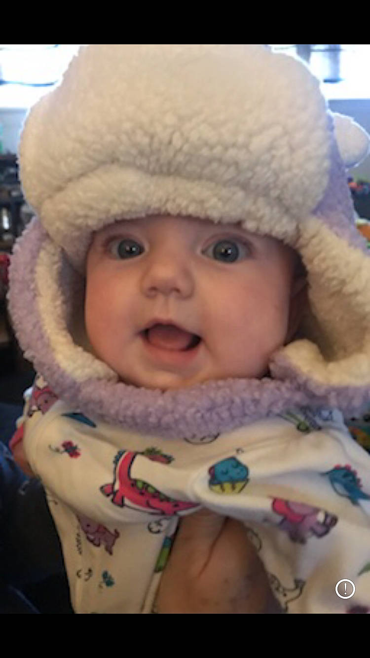 Lillyanna is registered to the contest to win money with this photo: baby, beanie, bonnet, cap, cheek, child, ear, face, facial_expression, hat, head, headgear, headwear, knit_cap, lip, mouth, nose, person, skin, smile