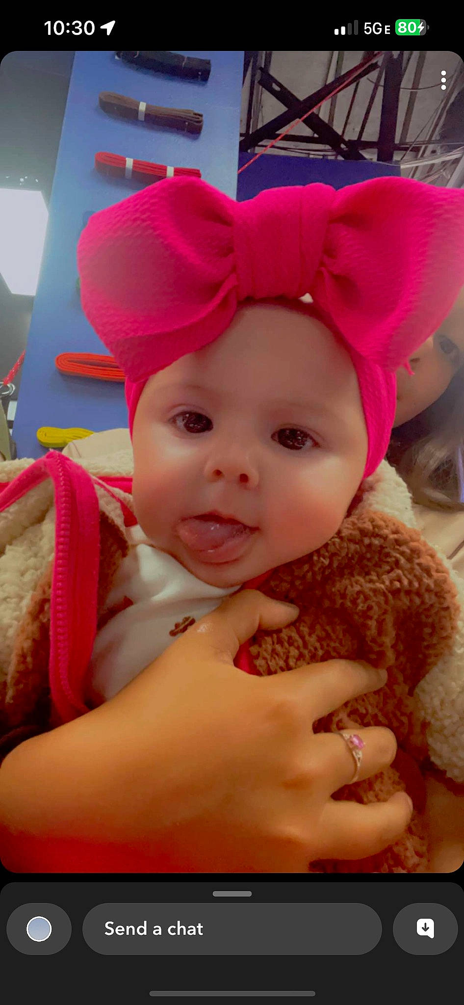 Leilani joined the competition — help win amazing prizes! baby, baby_toddler_clothing, cap, child, costume_hat, fashion_accessory, fun, gesture, happy, headband, headgear, headpiece, headwear, human_body, lip, magenta, nail, peach, person, pink