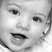 Klarys participe au concours pour gagner de l'argent avec cette photo : adorable, baby, black_and_white, blanket, child, close_up, clothing, collar, cute, eyelashes, eyes, face, hair, infant, portrait, skin, smile, teeth, toddler, tongue