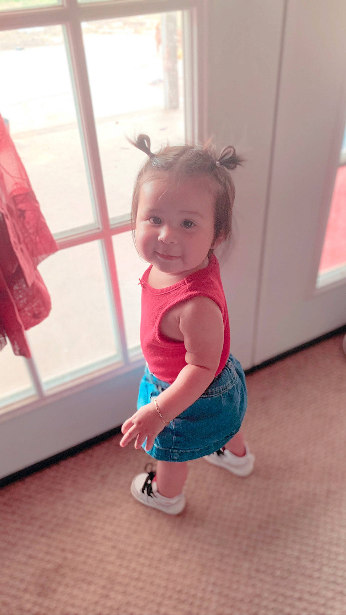 Alaiya is registered to the contest to win money with this photo: baby, baby_toddler_clothing, child, dress, eye, face, floor, flooring, happy, head, joy, leg, magenta, person, pink, sandal, shoulder, skin, smile, standing