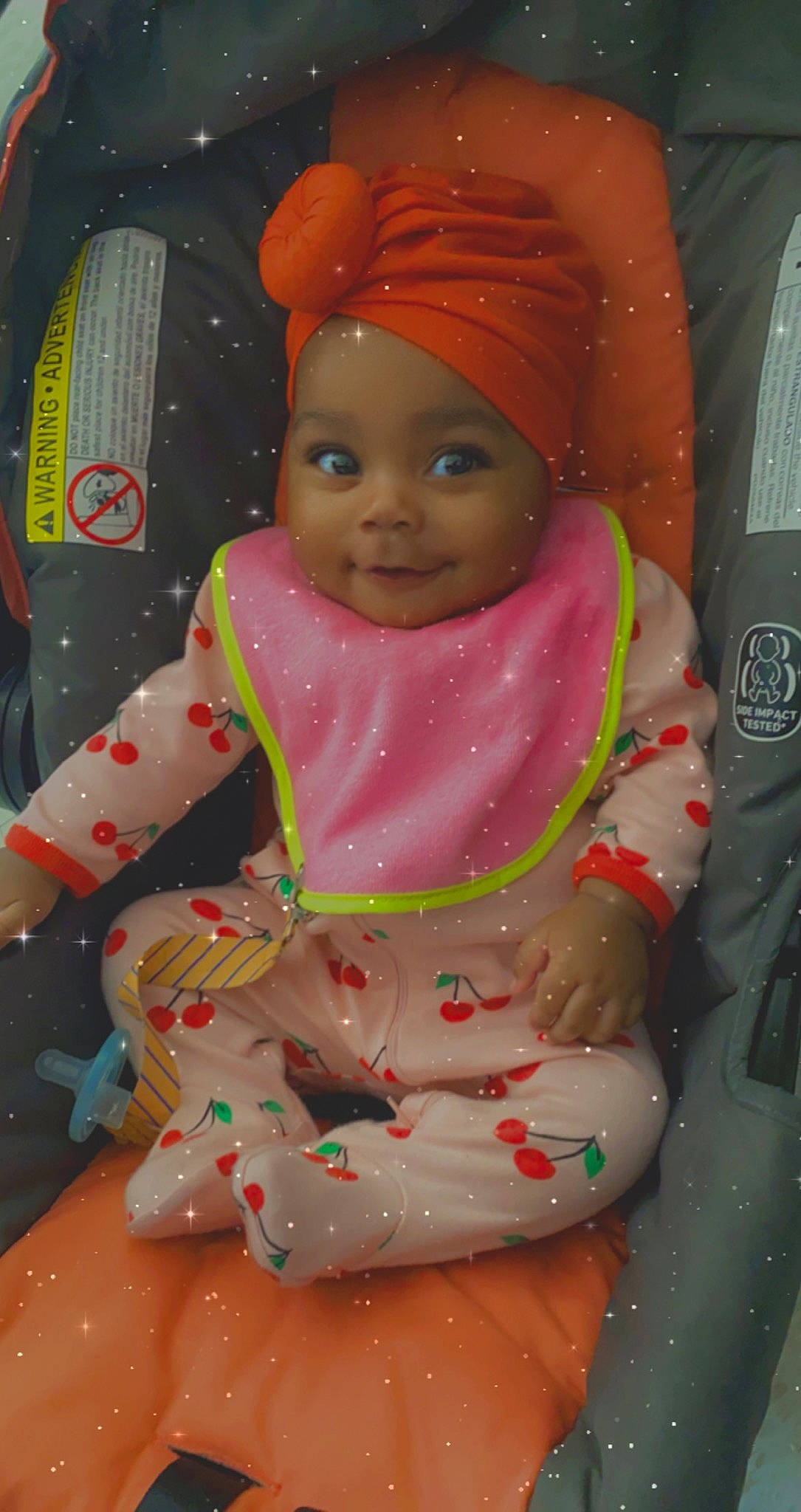 Carlee joined the competition — help win amazing prizes! baby_products, baby_toddler_clothing, baby_toys, cheek, headwear, orange, peach, person, pink