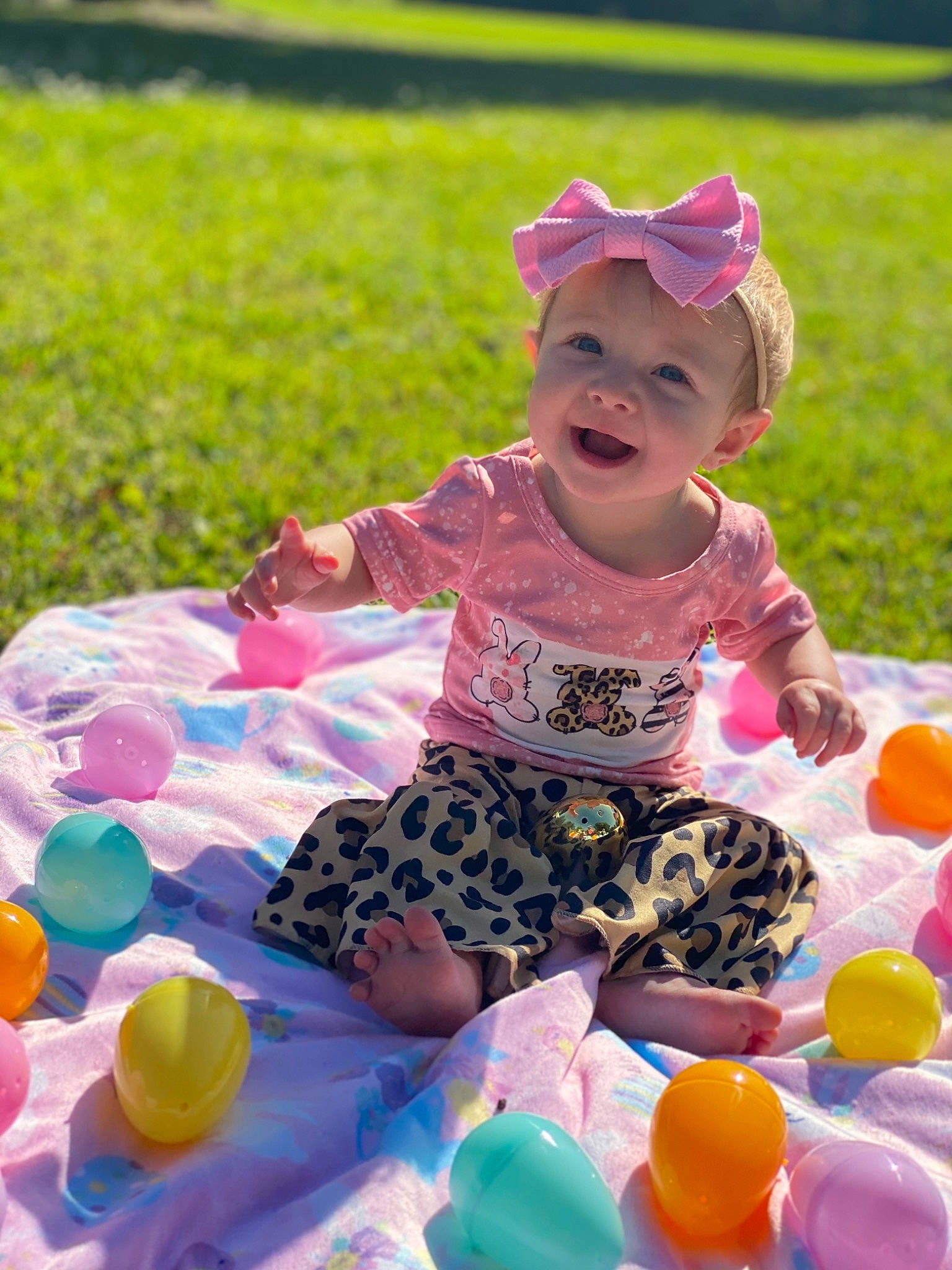 Raylee joined the competition — help win amazing prizes! baby, baby_toddler_clothing, balloon, child, event, fun, grass, happy, hat, headwear, leisure, magenta, people_in_nature, person, pink, plant, play, recreation, smile, summer
