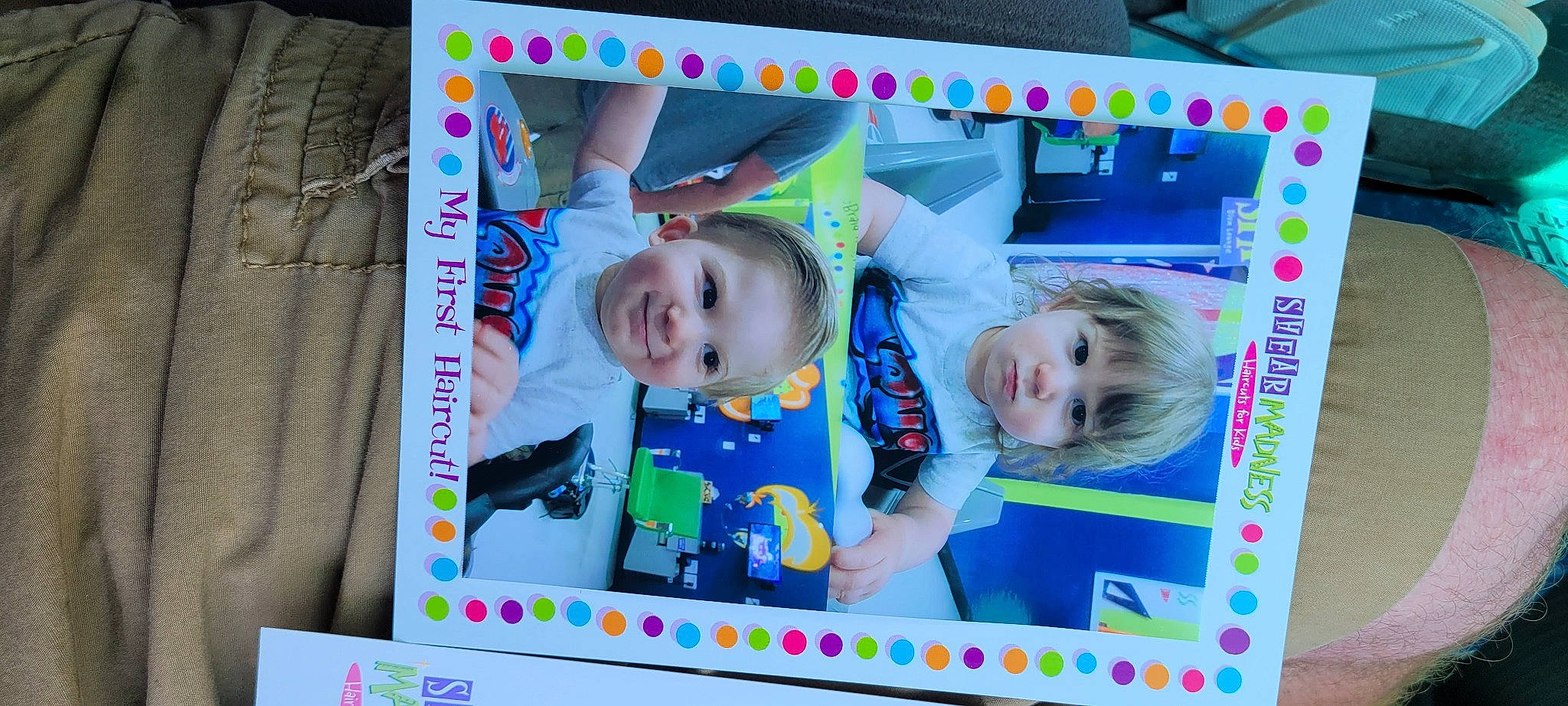 Levi is registered to the contest to win money with this photo: art, baby, baby_toddler_clothing, child, face, facial_expression, fun, green, happy, joy, person, photograph, picture_frame, pink, play, product, rectangle, room, smile, snapshot