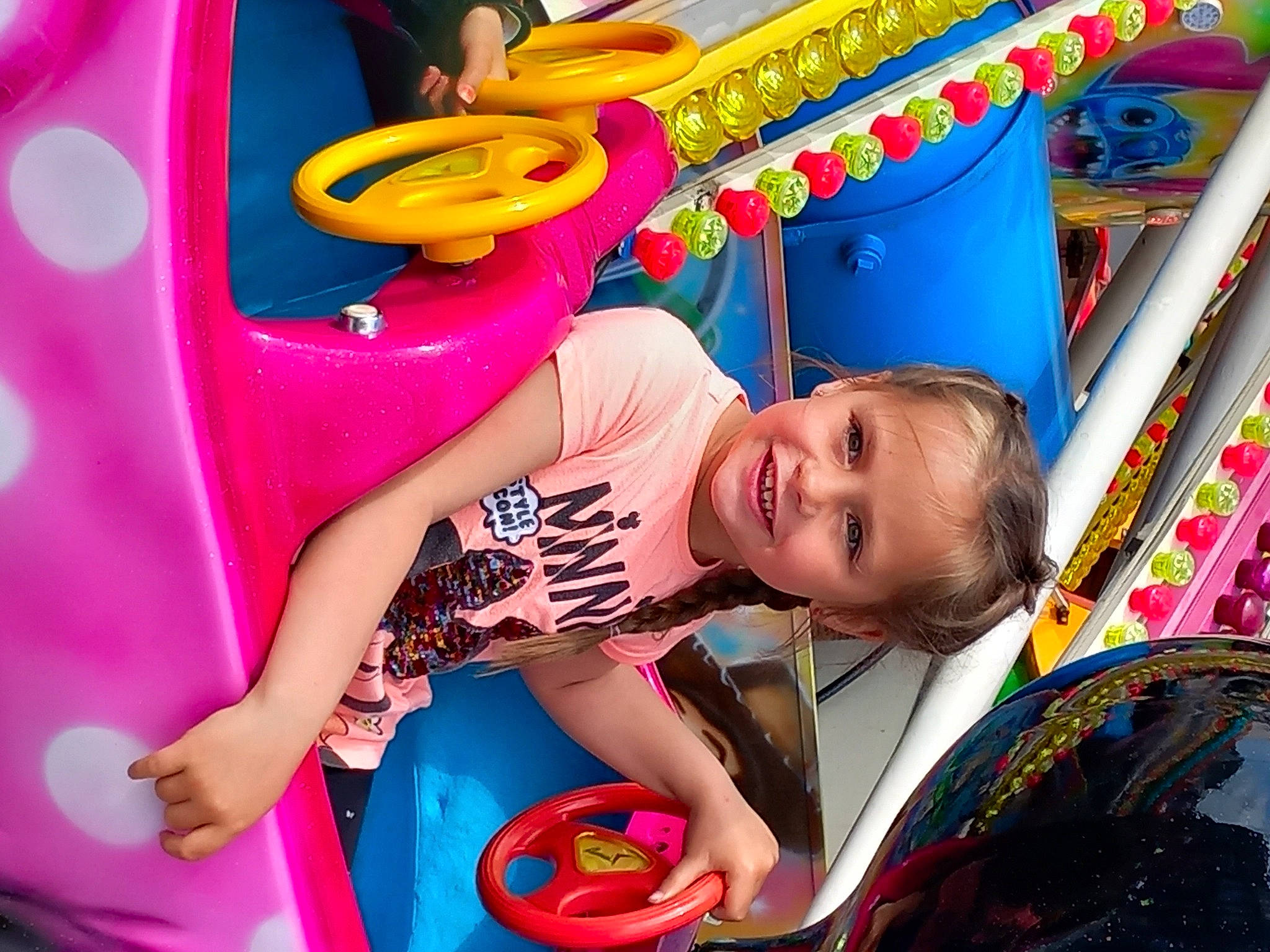 Inès a rejoint le concours — aidez-le/la à gagner de superbes lots ! amusement_park, amusement_ride, baby, baby_playing_with_toys, child, event, fun, happy, joy, leisure, magenta, nonbuilding_structure, person, photograph, pink, play, playground, product, recreation, smile