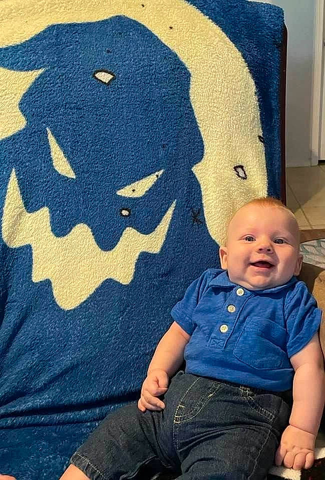 Zane joined the competition — help win amazing prizes! art, azure, baby, baby_toddler_clothing, black, blue, comfort, couch, electric_blue, facial_expression, hairstyle, happy, mammal, organ, pattern, person, product, smile, t_shirt, textile