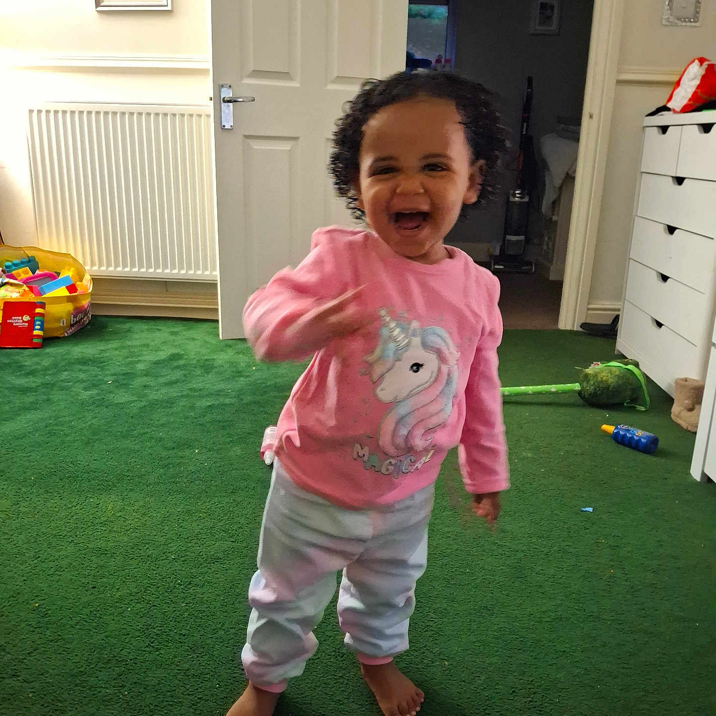 Emily joined the competition — help win amazing prizes! accessories, art, baby, bag, cabinet, clothing, door, face, furniture, glove, handbag, happy, head, indoors, painting, pants, person, photography, portrait, t_shirt
