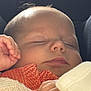 Joshua participe au concours pour gagner de l'argent avec cette photo : baby, sleeping, infant, hand, face, skin, knitted_clothing, cozy, soft_light, closeup, peaceful, cute, child, newborn, portrait, relaxation, indoors, warm, tiny_fingers, resting