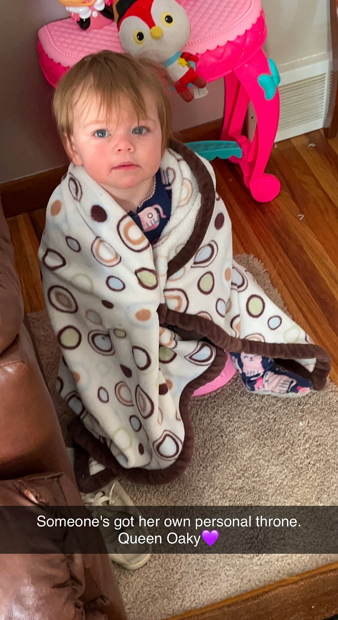 Oaklee is registered to the contest to win money with this photo: baby, baby_toddler_clothing, bangs, chair, cheek, child, flooring, hair, hairstyle, happy, head, magenta, neck, outerwear, pattern, person, pink, skin, sleeve, toddler