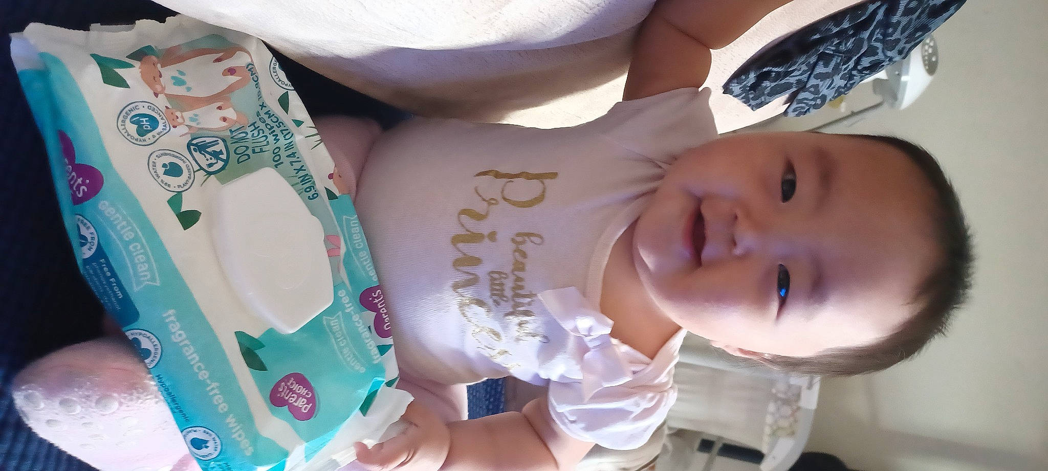 Jamie joined the competition — help win amazing prizes! baby, baby_toddler_clothing, cheek, chest, child, drinkware, finger, font, gesture, hand, happy, human_body, human_leg, nail, person, skin, smile, thumb, toddler, water