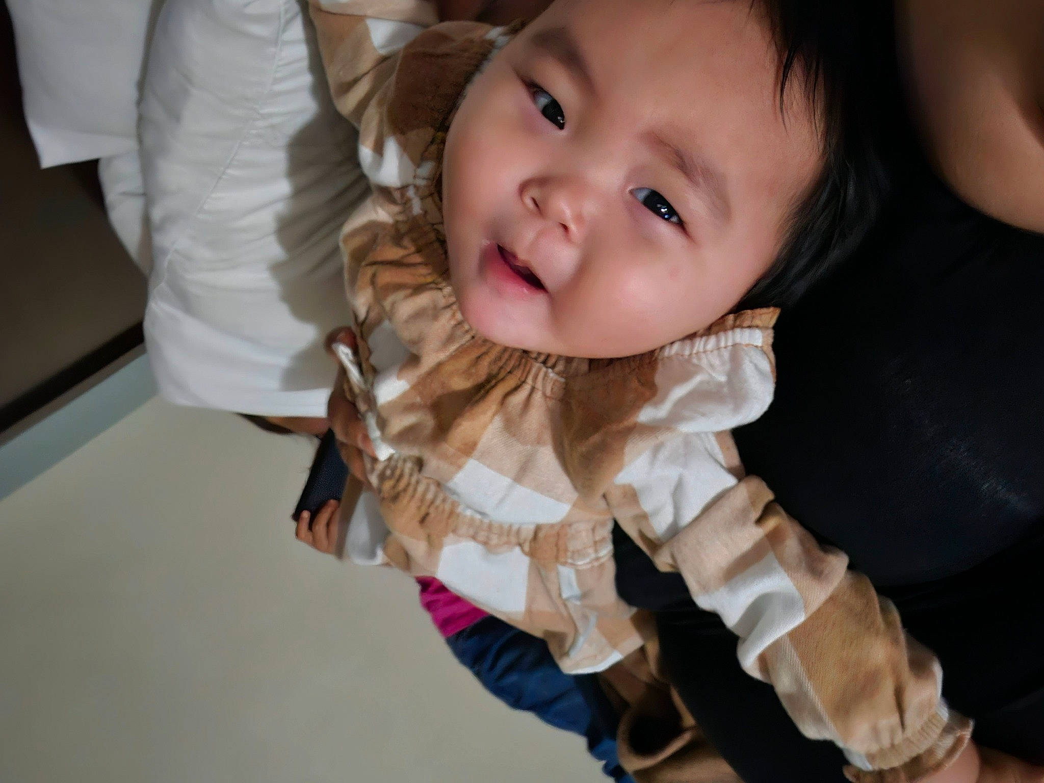 Jamie is registered to the contest to win money with this photo: baby, baby_toddler_clothing, cheek, child, eye, eyebrow, eyelash, finger, flash_photography, gesture, happy, iris, lip, mouth, nose, person, sitting, skin, sleeve, smile