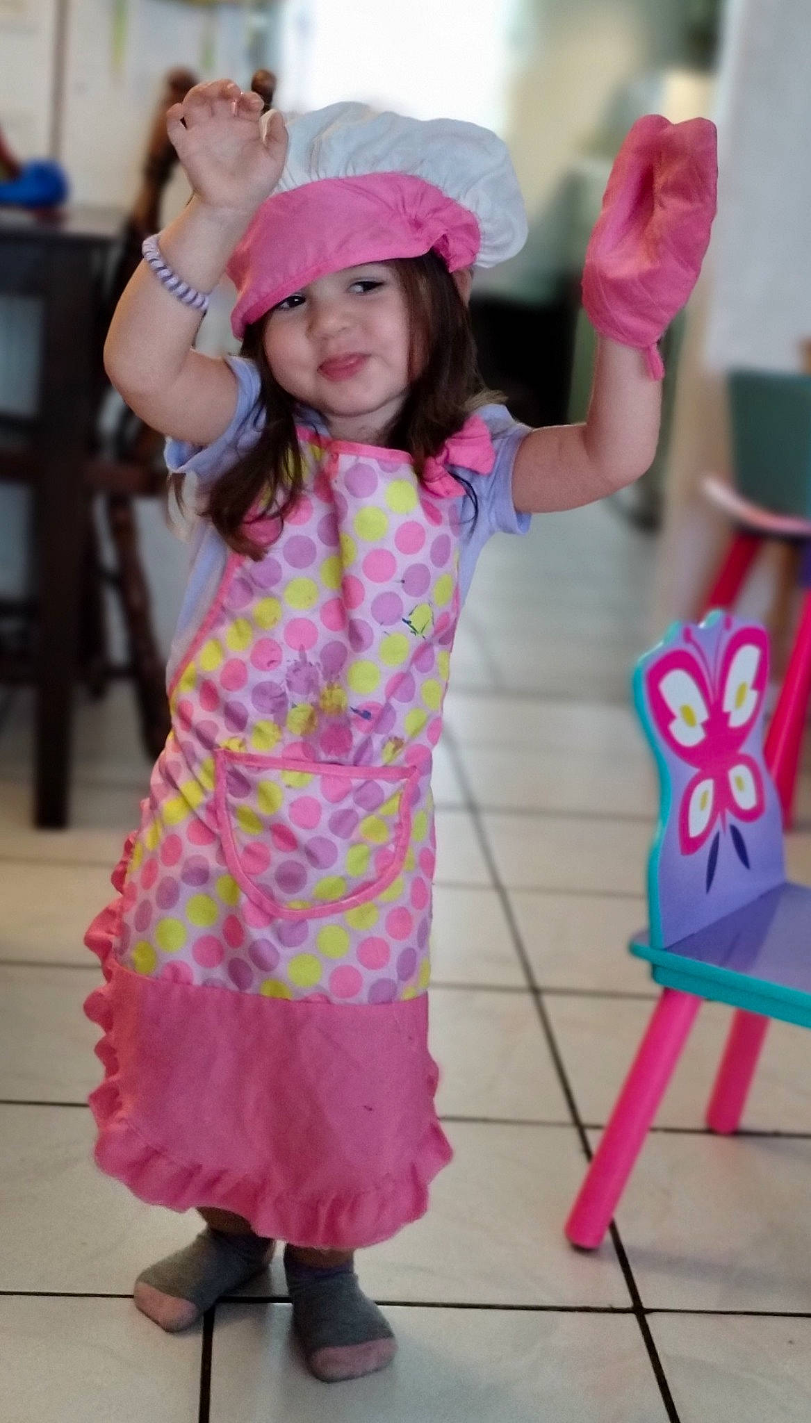 Adalynn joined the competition — help win amazing prizes! beauty, child, clothing, dress, entertainment, event, facial_expression, fun, happy, hat, headwear, leisure, magenta, pattern, person, pink, purple, sleeve, standing, toddler