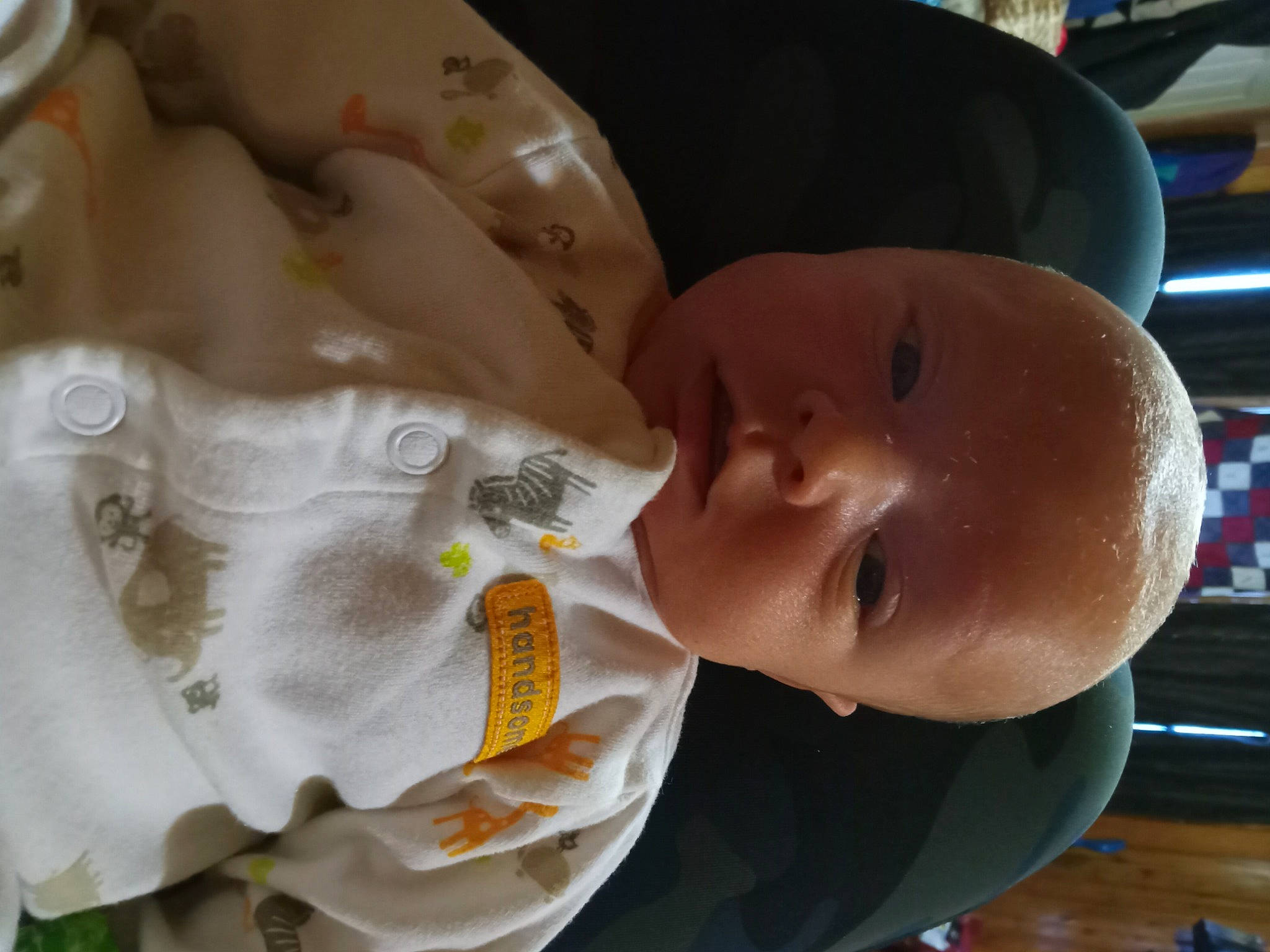 Brayson is registered to the contest to win money with this photo: baby, baby_products, baby_toddler_clothing, cheek, chest, child, comfort_food, drinkware, fun, happy, hat, helmet, person, skin, smile, toddler, water