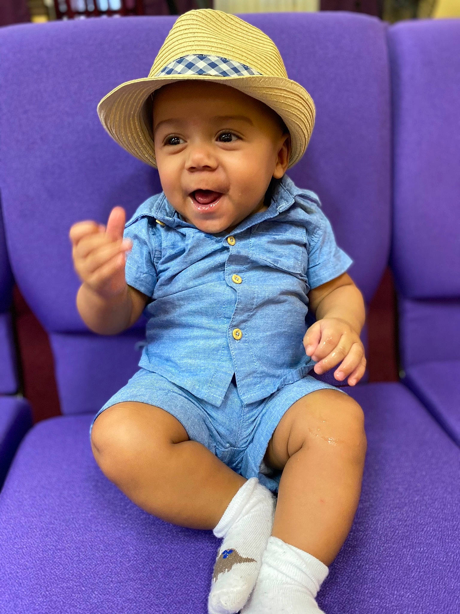 Garrett is registered to the contest to win money with this photo: baby_toddler_clothing, blue, clothing, dress, eye, face, facial_expression, happy, hat, head, headwear, iris, lip, mouth, organ, person, purple, skin, smile, sun_hat