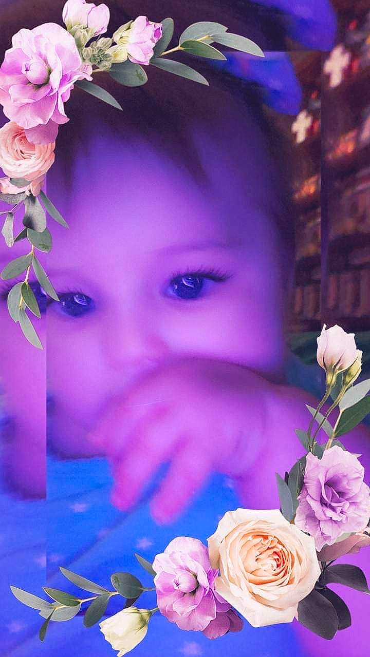 Kimberlyn is registered to the contest to win money with this photo: blue, botany, electric_blue, eye, eyelash, flash_photography, flower, flower_arranging, flowering_plant, happy, hybrid_tea_rose, iris, magenta, nature, person, petal, pink, plant, purple, rose