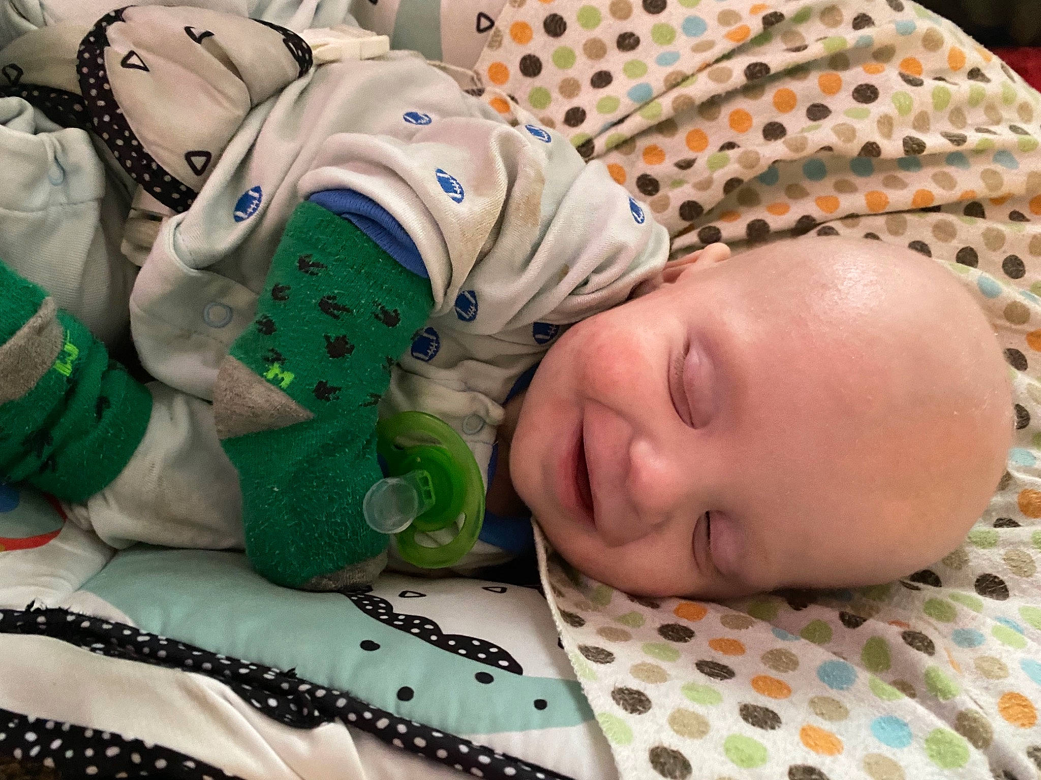 Klayton is registered to the contest to win money with this photo: baby, baby_toddler_clothing, cheek, child, comfort, eye, face, happy, head, human, mammal, mouth, organ, people, person, skin, smile, sports_gear, textile, toddler
