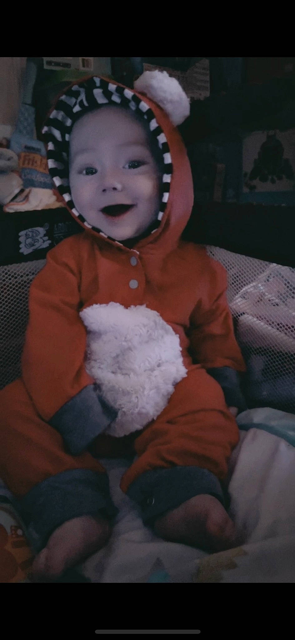 Koen joined the competition — help win amazing prizes! baby, baby_toddler_clothing, cheek, child, comfort, eye, fun, fur, happy, head, headgear, headwear, lap, mouth, person, purple, room, sitting, skin, smile