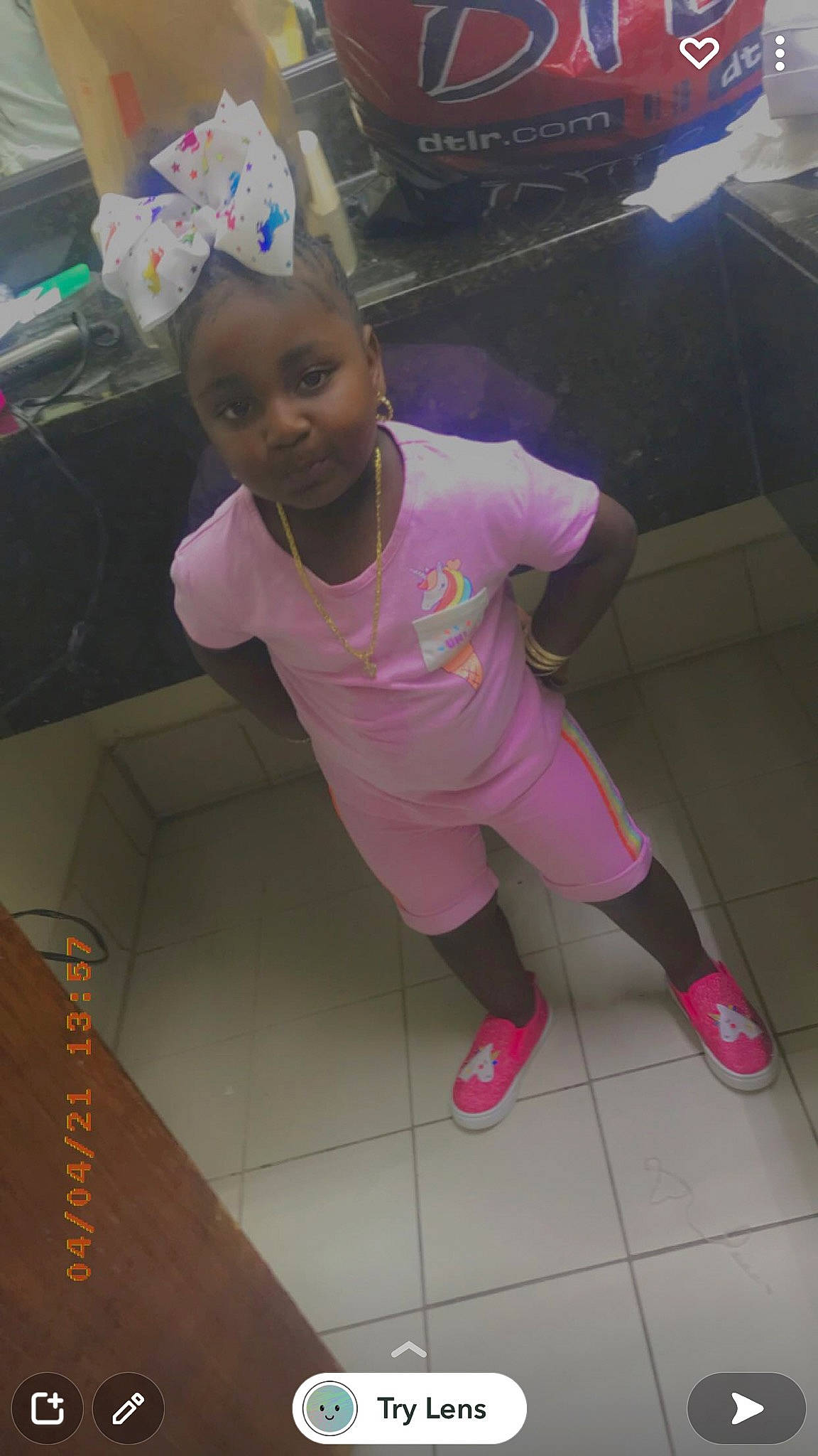 Honestie is registered to the contest to win money with this photo: child, floor, flooring, fun, happy, human_leg, knee, leg, leisure, magenta, person, pink, purple, sandal, smile, sock, sportswear, t_shirt, thigh, thumb