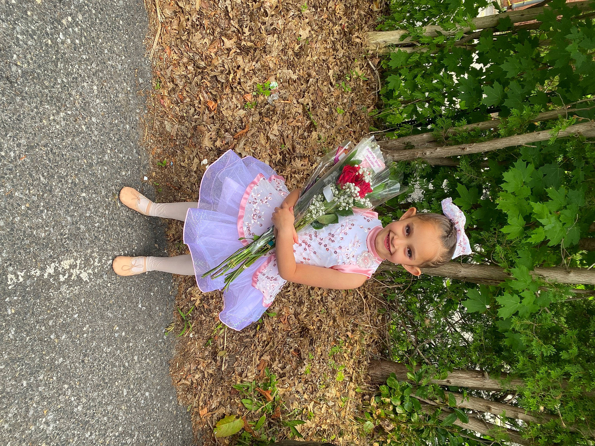 Audrina joined the competition — help win amazing prizes! asphalt, baby_toddler_clothing, child, dress, flower, foot, garden, grass, groundcover, happy, human_leg, joy, leisure, people_in_nature, person, plant, road_surface, shrub, sidewalk, tar