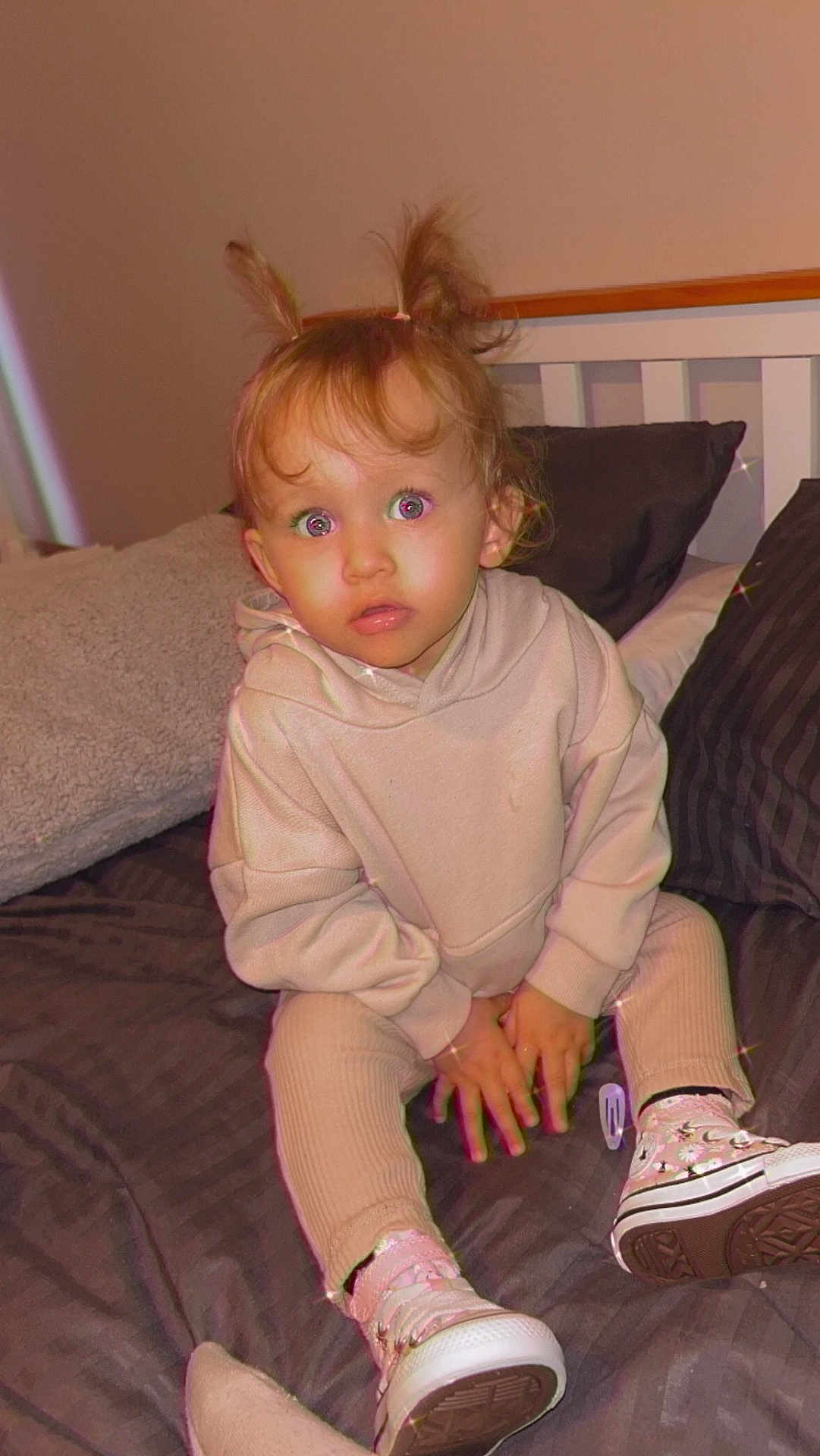 Esme-Ella is registered to the contest to win money with this photo: baby, bed, bodypart, clothing, couch, cushion, face, finger, footwear, furniture, hand, head, homedecor, person, photography, portrait, runningshoe, shoe, sitting, sneaker