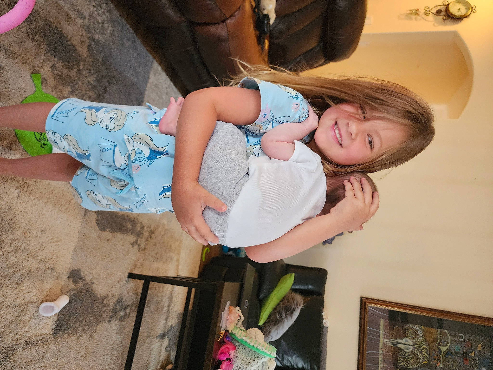 Sophia joined the competition — help win amazing prizes! baby, chair, child, flip_flops, foot, fun, happy, human_leg, joy, leisure, mechanical_fan, person, picture_frame, room, sandal, sitting, smile, thigh, toddler, vacation