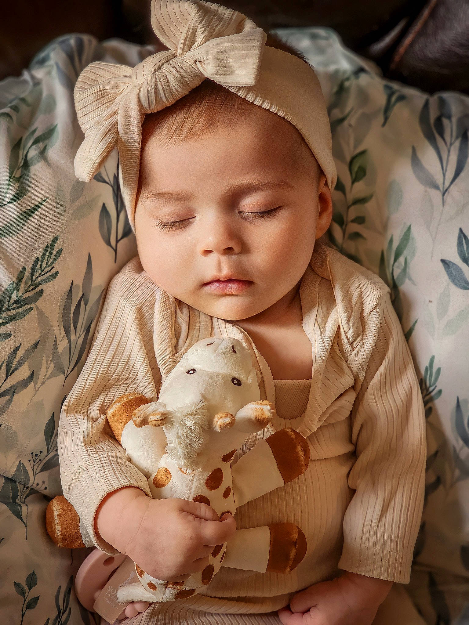 Olivia Rose is registered to the contest to win money with this photo: baby, baby_toddler_clothing, beige, cheek, child, comfort, dress, ear, eye, face, head, iris, linens, lip, mammal, person, product, skin, sleeve, textile