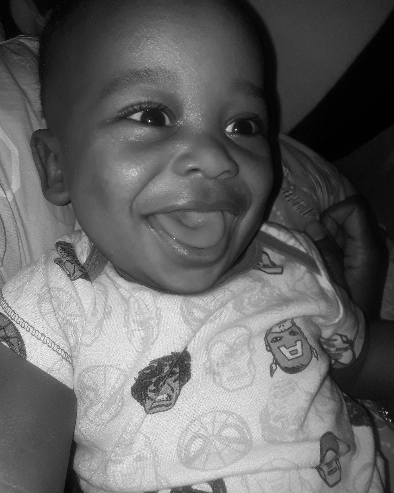 Mehki is registered to the contest to win money with this photo: baby, black, black_and_white, cheek, child, eye, face, facial_expression, forehead, fun, head, human, lip, monochrome, mouth, nose, people, person, skin, smile