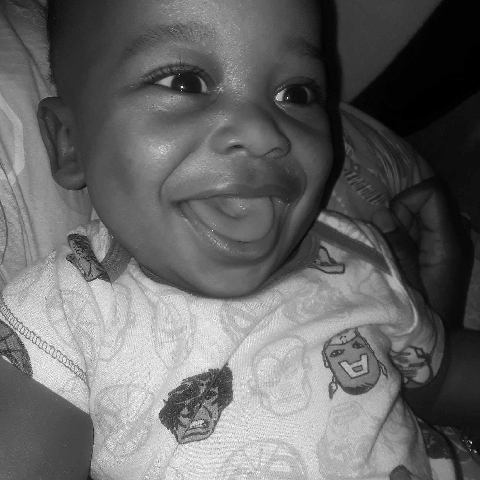 Mehki is registered to the contest to win money with this photo: baby, black, black_and_white, cheek, child, eye, face, facial_expression, forehead, fun, head, human, lip, monochrome, mouth, nose, people, person, skin, smile