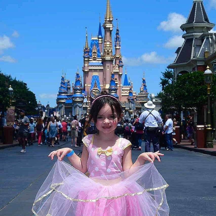Isabella joined the competition — help win amazing prizes! beauty, cloud, event, fun, happy, joy, leisure, people, person, photograph, pink, recreation, sky, skyscraper, smile, snapshot, summer, travel, turret, walt_disney_world