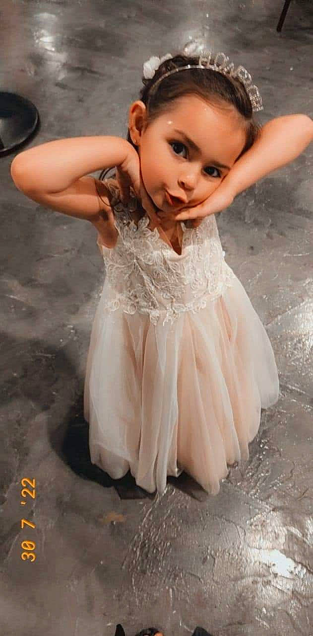 Isabella joined the competition — help win amazing prizes! baby_toddler_clothing, blond, bridal_accessory, brown_hair, child, day_dress, dress, embellishment, face, fashion_design, flash_photography, fun, gesture, happy, headgear, iris, long_hair, person, skin, toddler